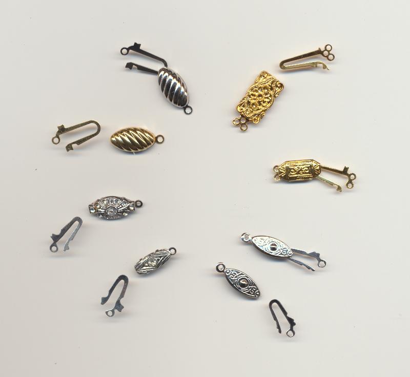 Fish-hook clasps - open: old and new, plain and decorated, nickel