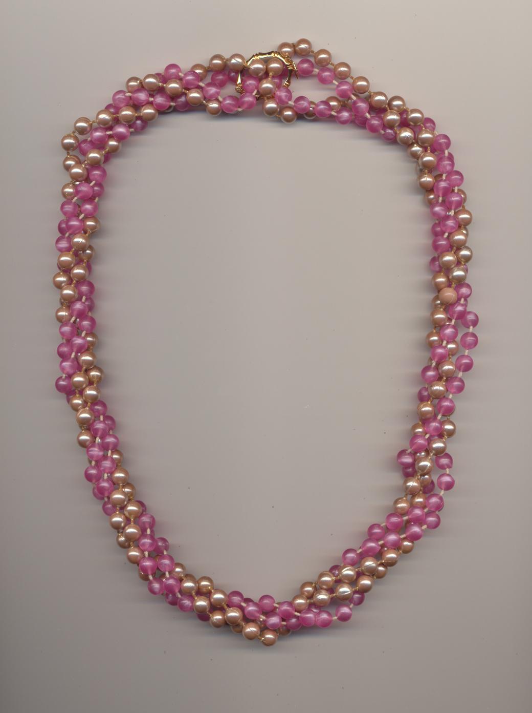 A Twisted Four Strand Bead Necklace Made Of Two Necklaces And A Pearl Shortener