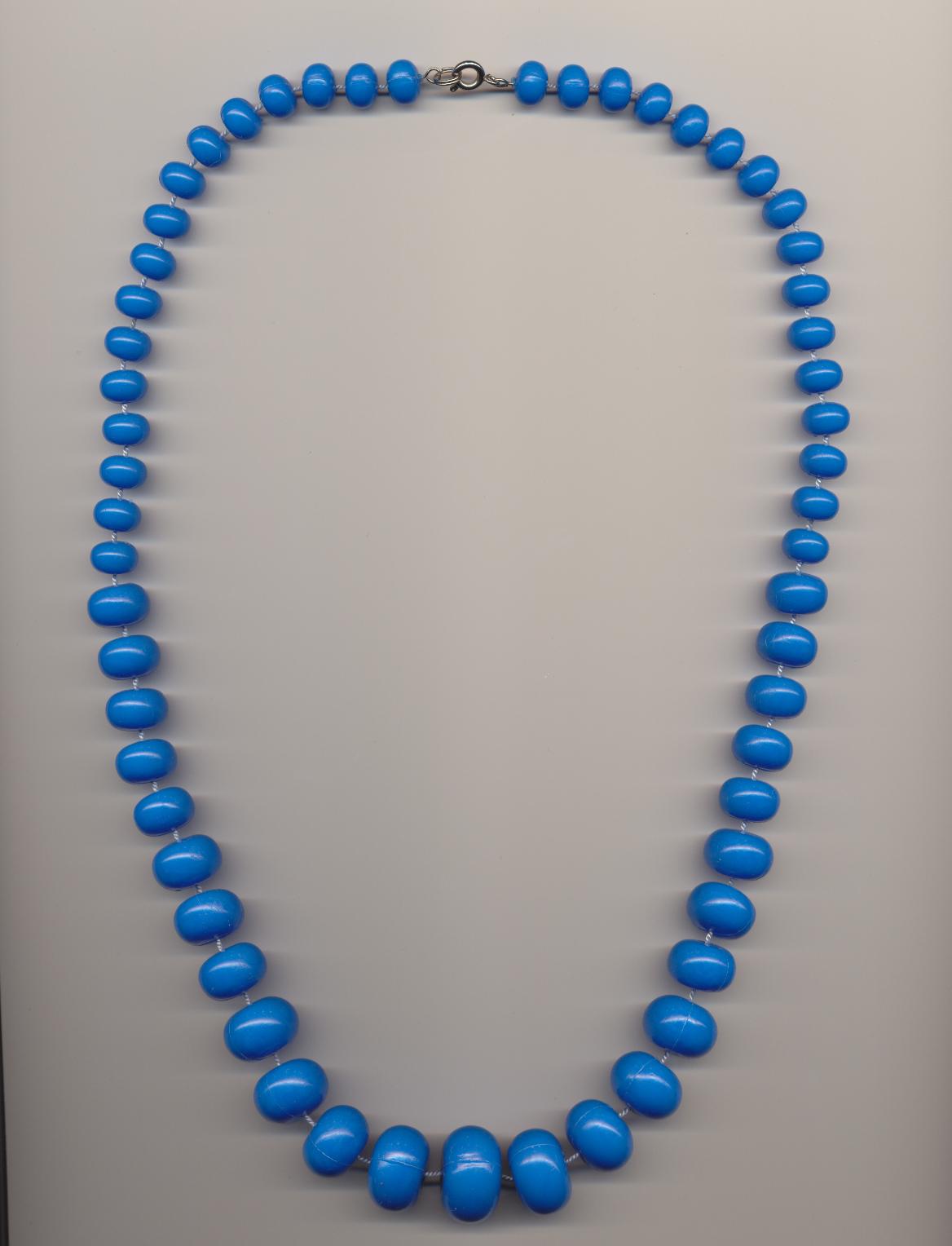 Graduated bright blue plastic imitation bead necklace, with clasp, 1970's, length 24'' 60cm.