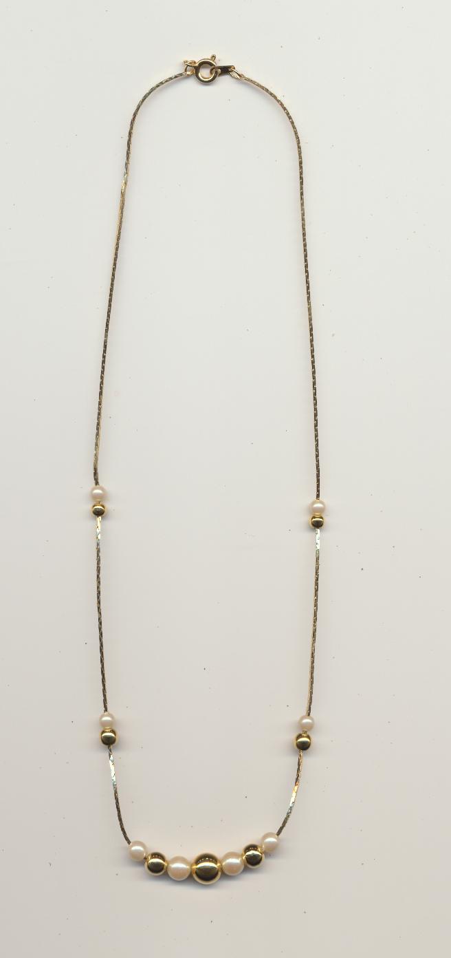 Modest necklace of gold color beads and imitation pearls on gold color chain, made in Korea, length 24'' 60cm.